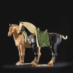 A Pair of Magnificent Sancai-Glazed Pottery Horses Tang Dynasty Sells for  $4,197,000
